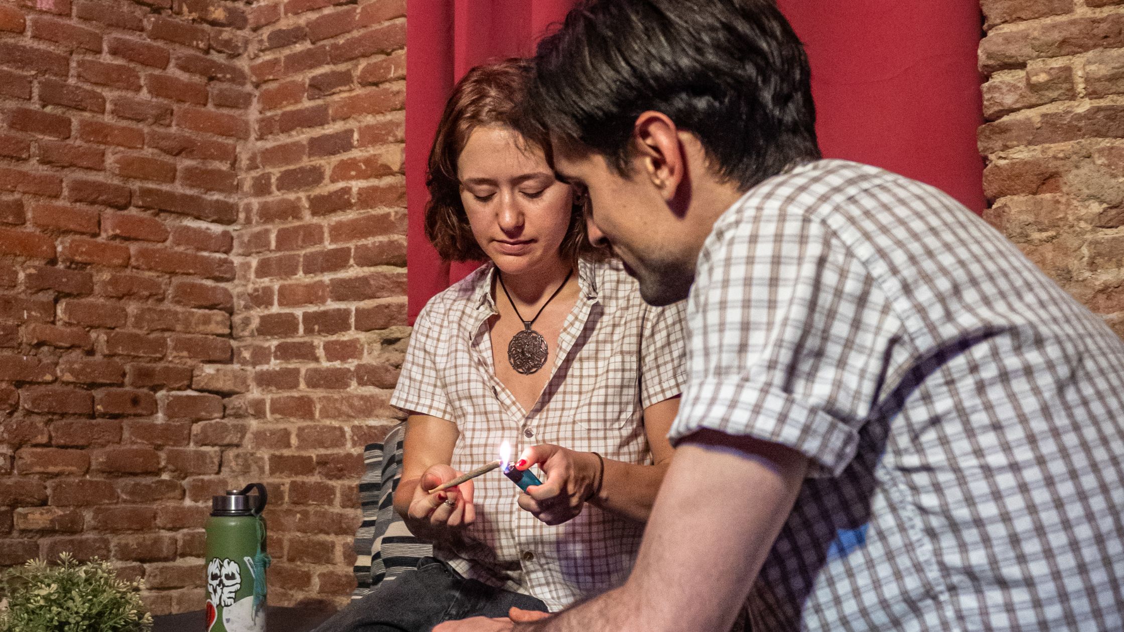 couple in a legal weed in madrid club